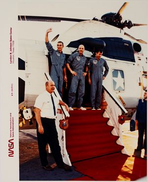 The Apollo 10 astronauts Thoms P. Stafford, J. W. Young and E. A. Cernan are greeted by D. E. Stullke, Manned Space Center