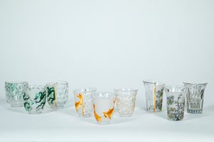 CTRLZAK Art & Design Studio &times; Seletti &mdash; Hybrid Agluara. Nove bicchieri da cocktail in vetro trasparente con decori policromi e dorati a motivo orientali occidentali.