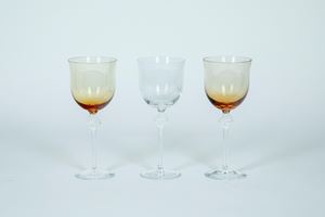 Lalique France. Three clear and amber crystal glasses.