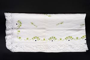 Hand-embroidered linen sideboard cover