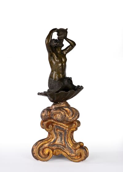 Tritone in Bronzo Patinato su una Base Rocaille in Legno Intagliato e Dorato. Secolo XVIII