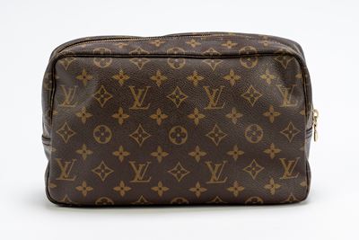 Trousse da viaggio in tela con monogramma, chiusura a cerniera e dettagli in metallo dorato
