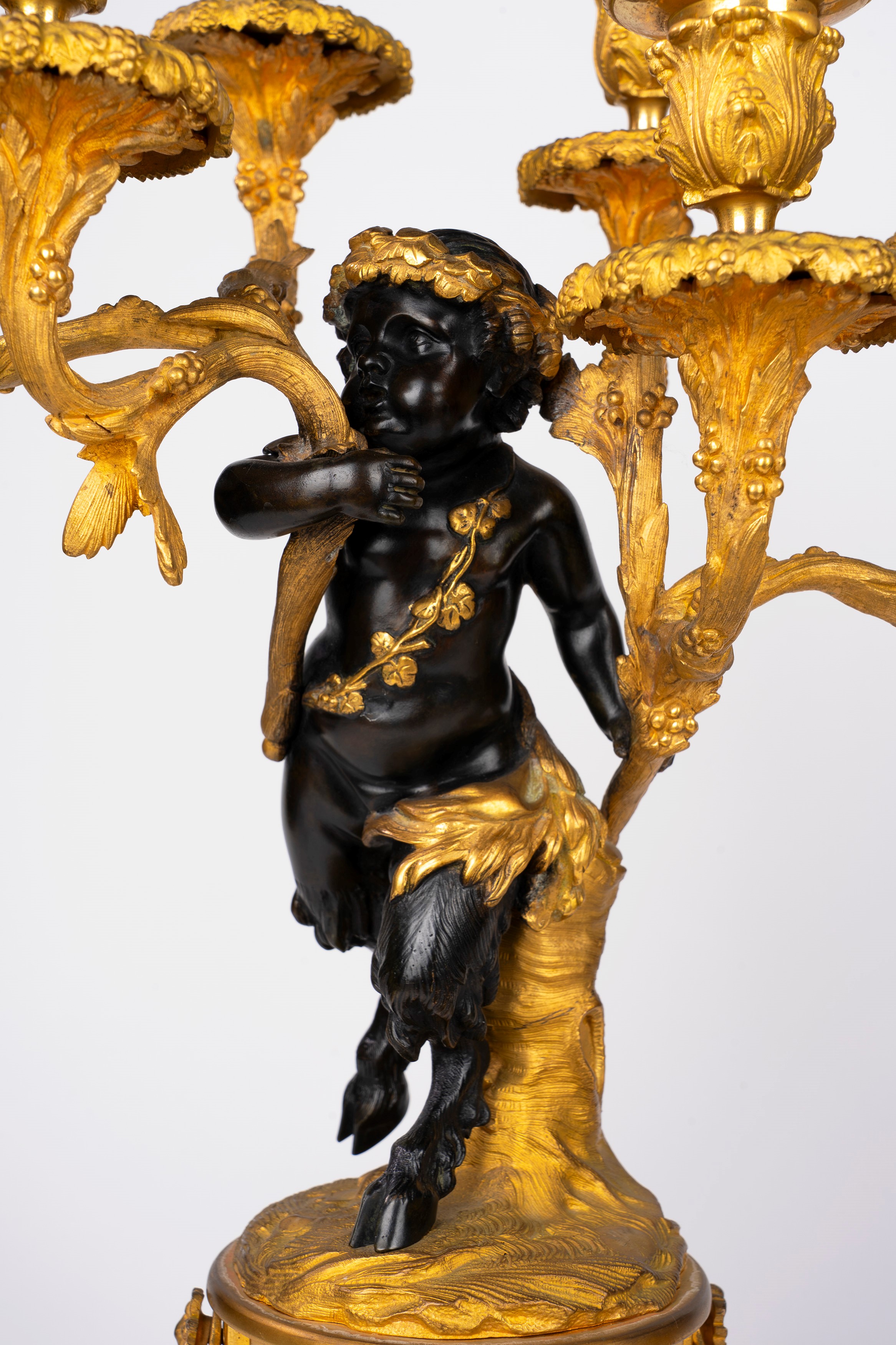 Fauno, Coppia di candelabri a sei luci in bronzo dorato e patinato, Francia, inizio XX secolo