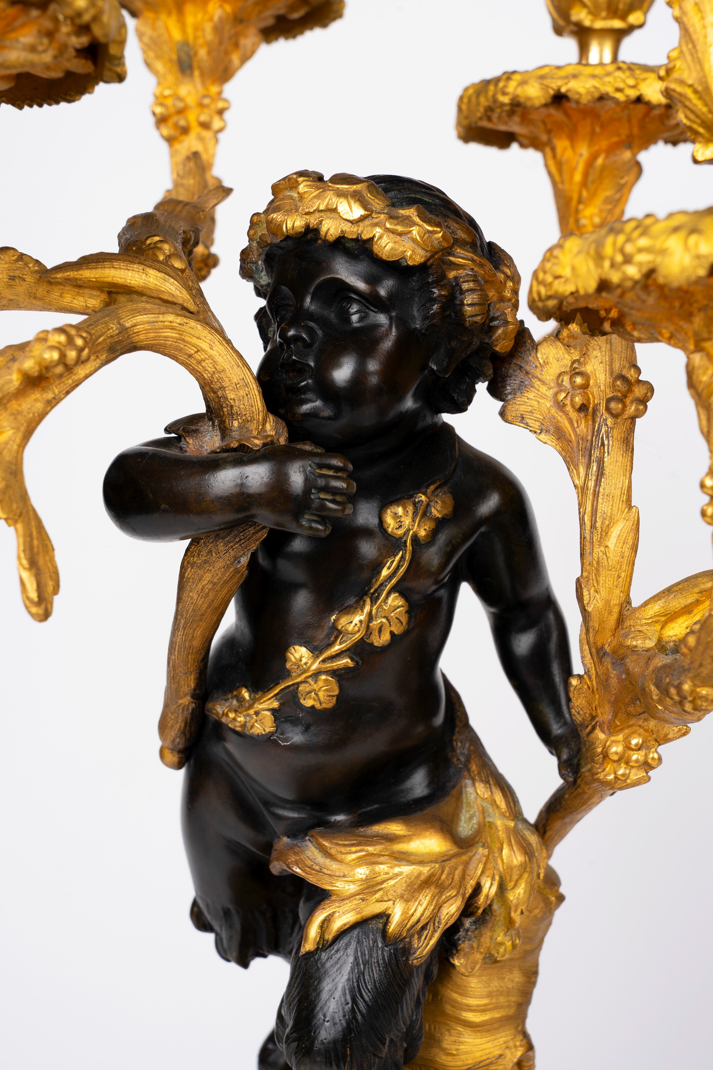 Fauno, Coppia di candelabri a sei luci in bronzo dorato e patinato, Francia, inizio XX secolo