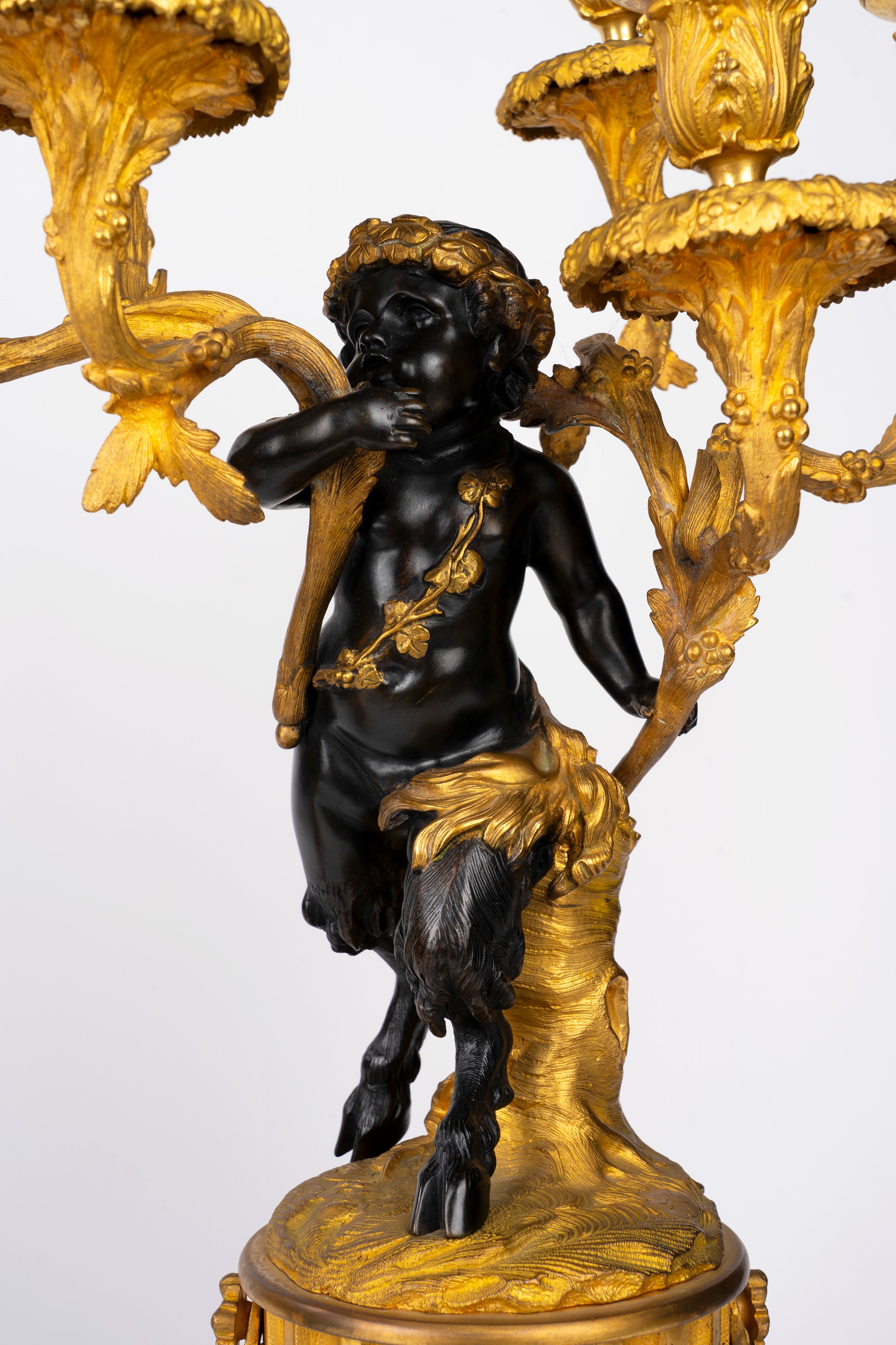 Fauno, Coppia di candelabri a sei luci in bronzo dorato e patinato, Francia, inizio XX secolo