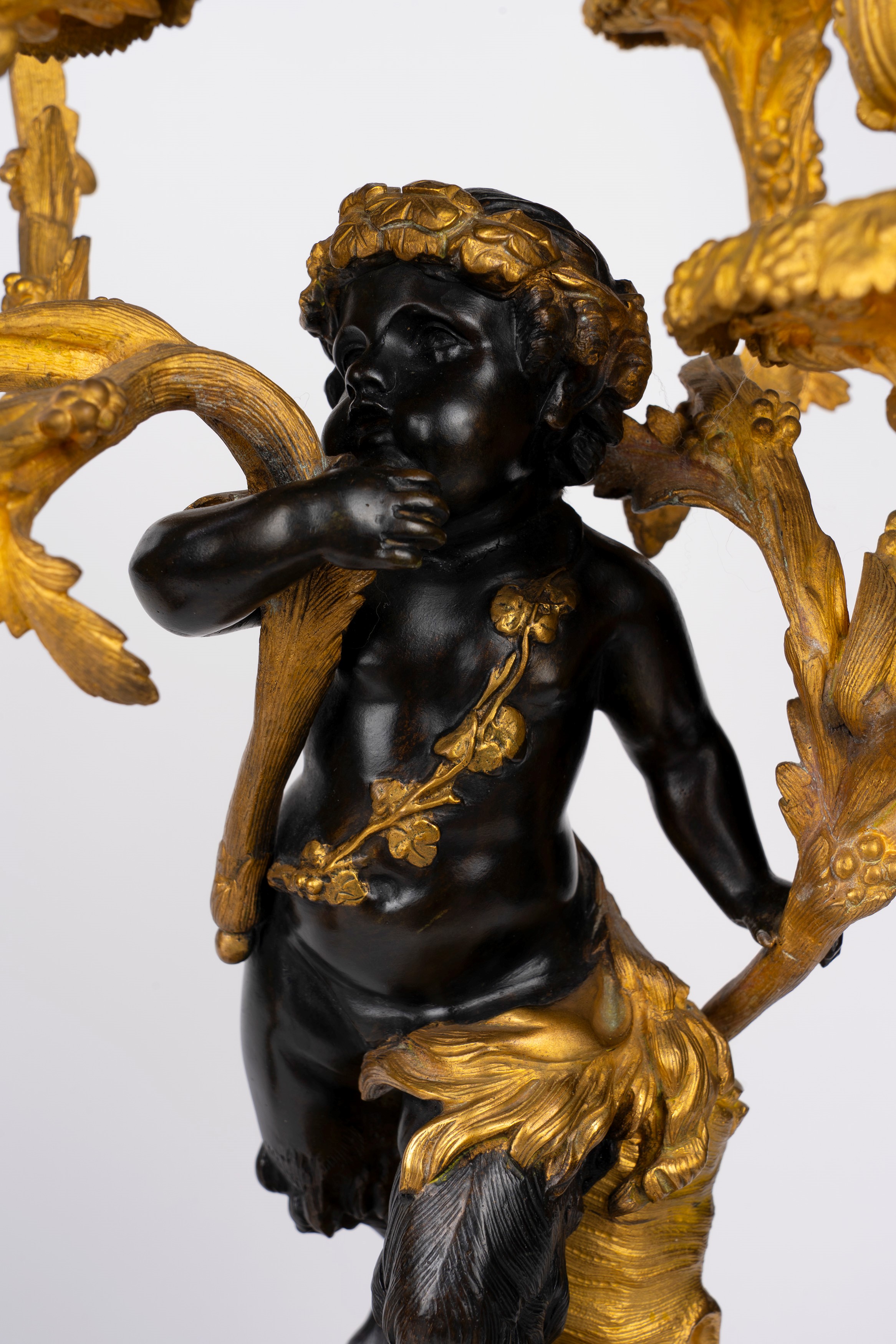 Fauno, Coppia di candelabri a sei luci in bronzo dorato e patinato, Francia, inizio XX secolo