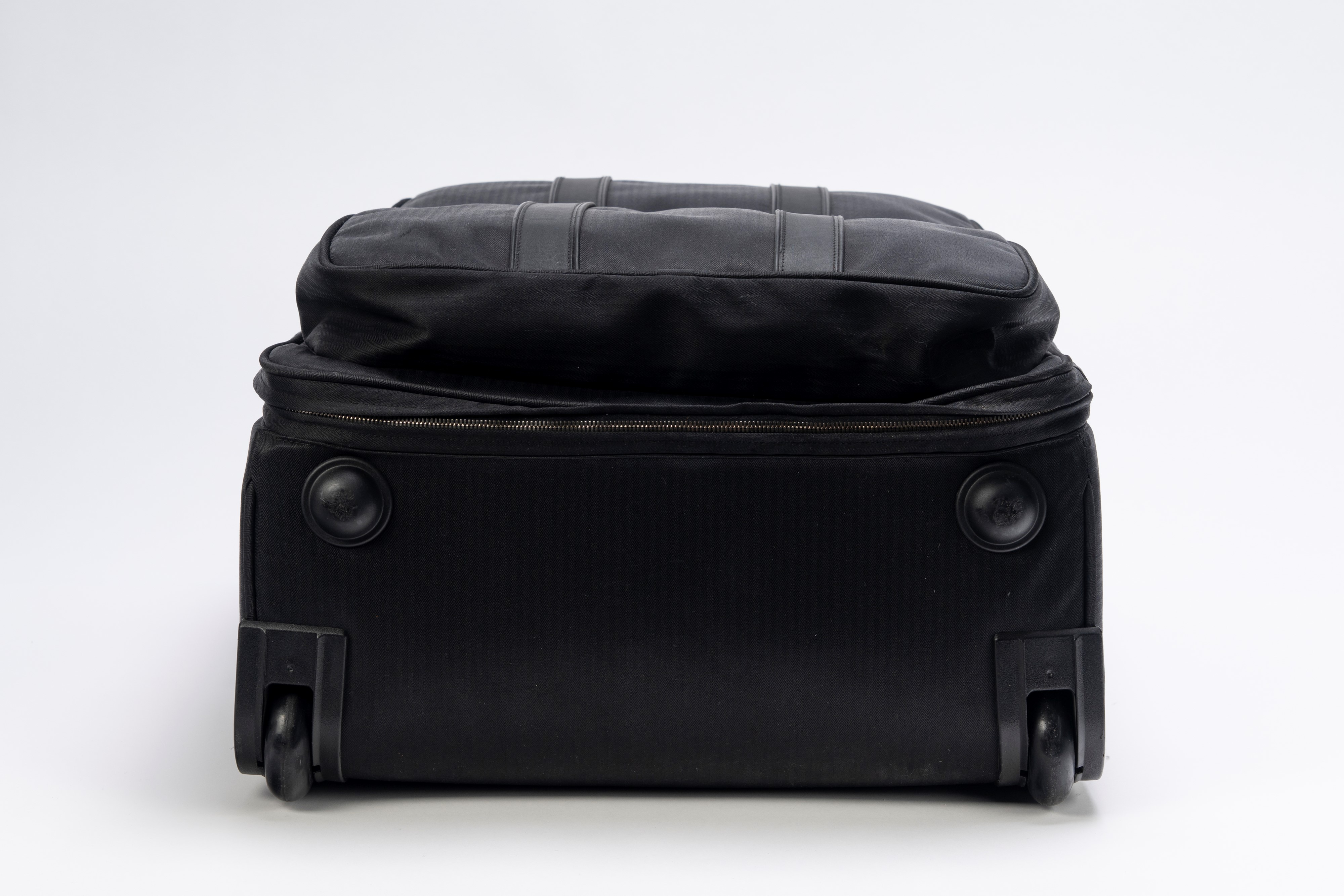 Hermès - Trolley in tessuto tecnico nero con chiusure a cerniera, dettagli Clou de selle in palla...
