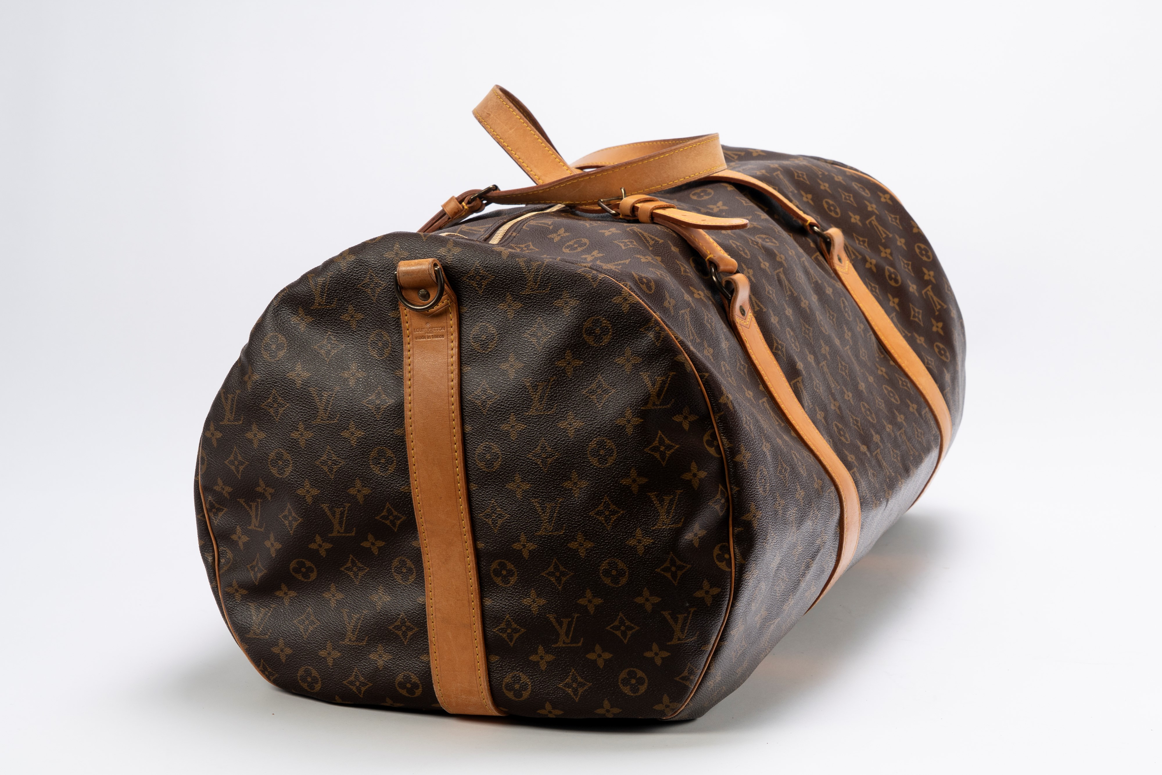Louis Vuitton - Valigia Polochon in tela con monogramma, doppi manici in cuoio e tracolla staccab...