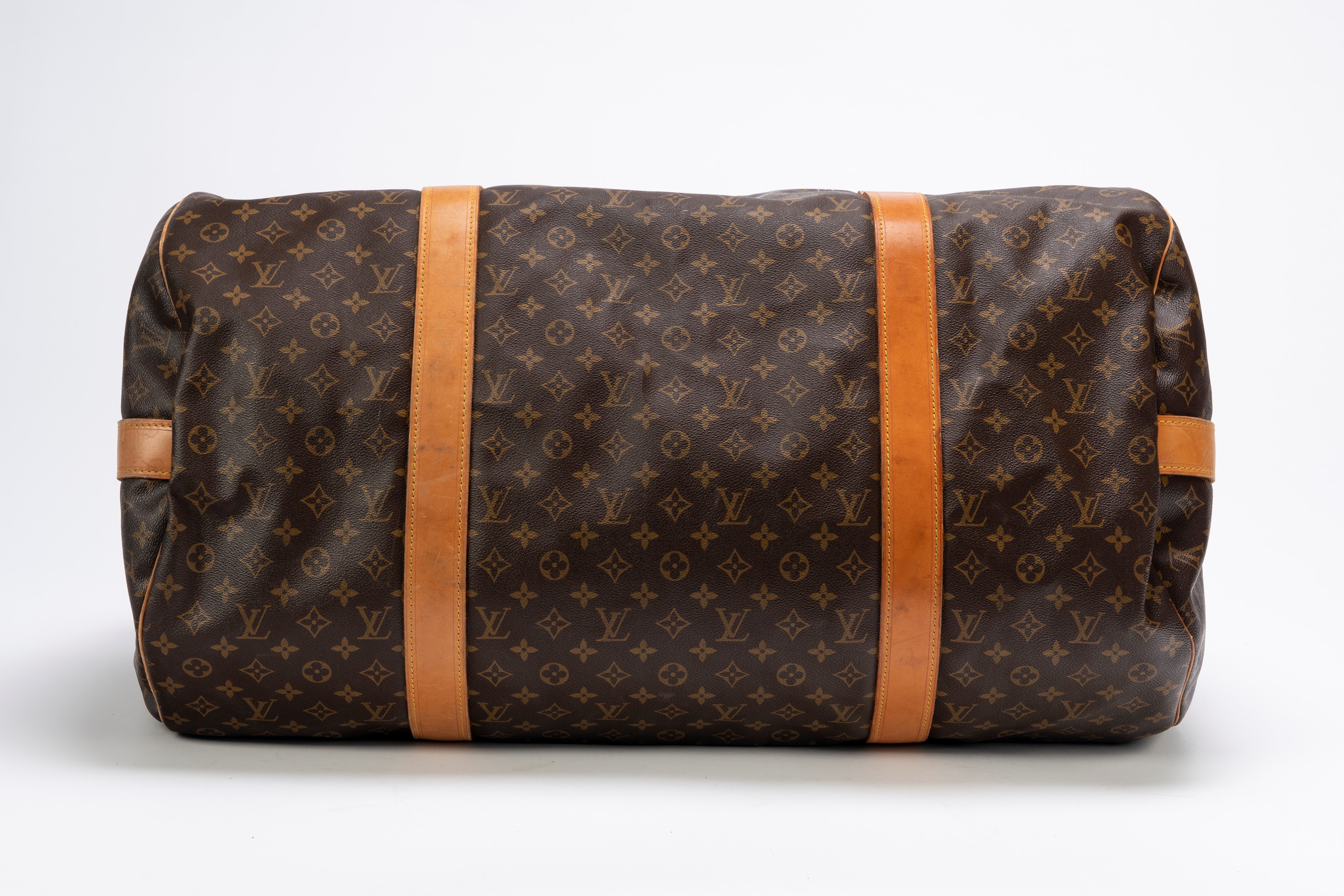 Louis Vuitton - Valigia Polochon in tela con monogramma, doppi manici in cuoio e tracolla staccab...