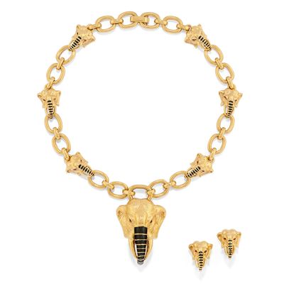 Demi-parure animalier in oro giallo 18k con teste di elefante