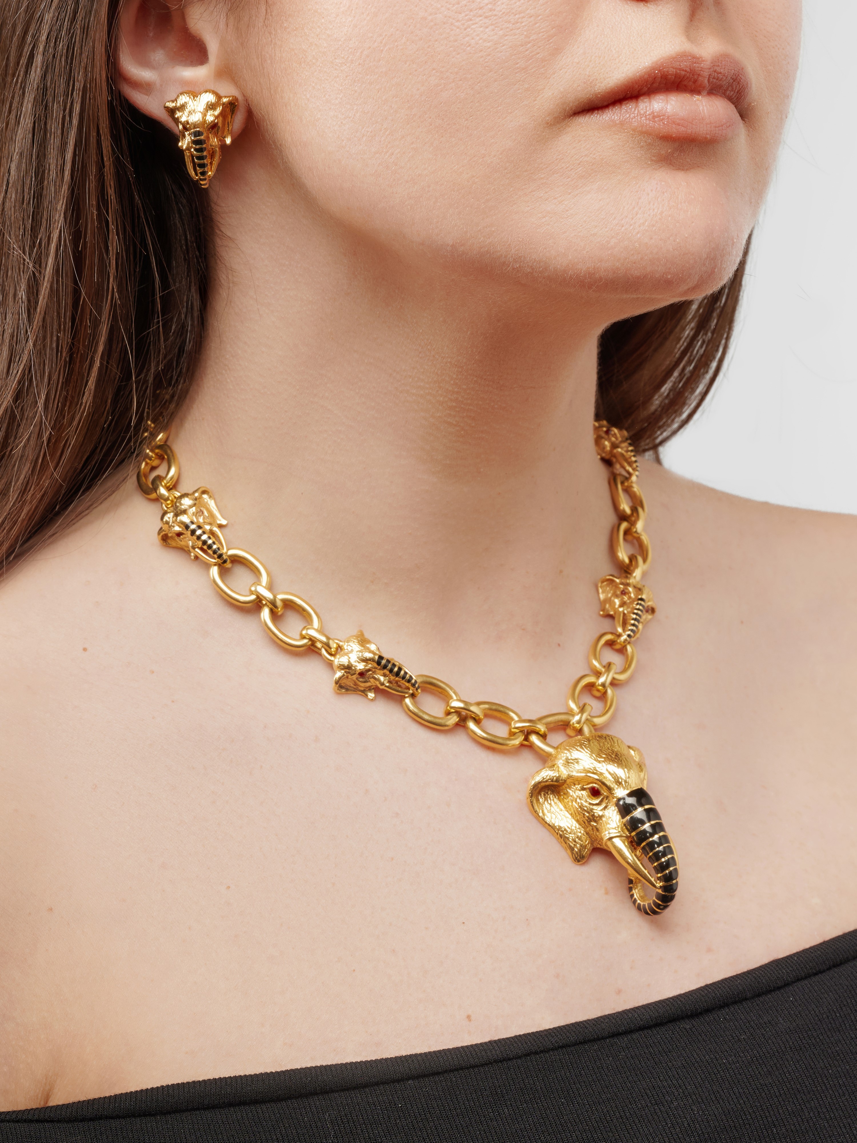 David Webb - Demi-parure animalier in oro giallo 18k con teste di elefante
