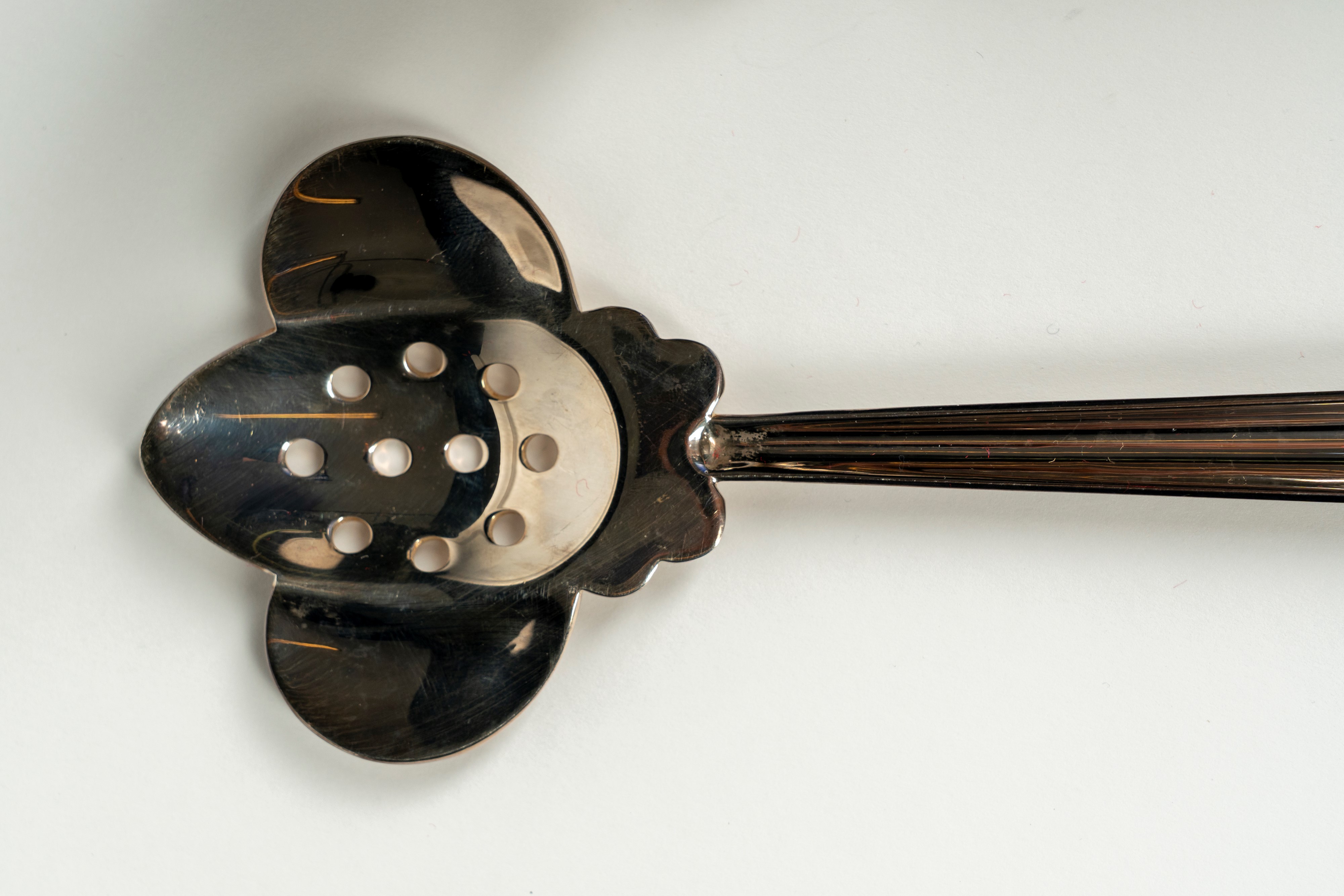 Driade. Sette posate da servizio in metallo argentato