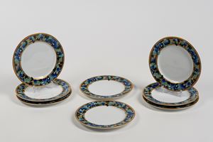 Pomellato, twenty porcelain bread plates with gilded and polychrome edges
