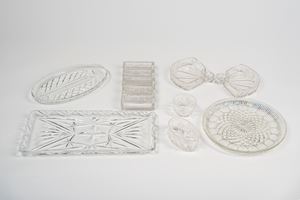 Set of fourteen cut crystal tableware dishes of various uses and decorations. Second half of the 20th century.