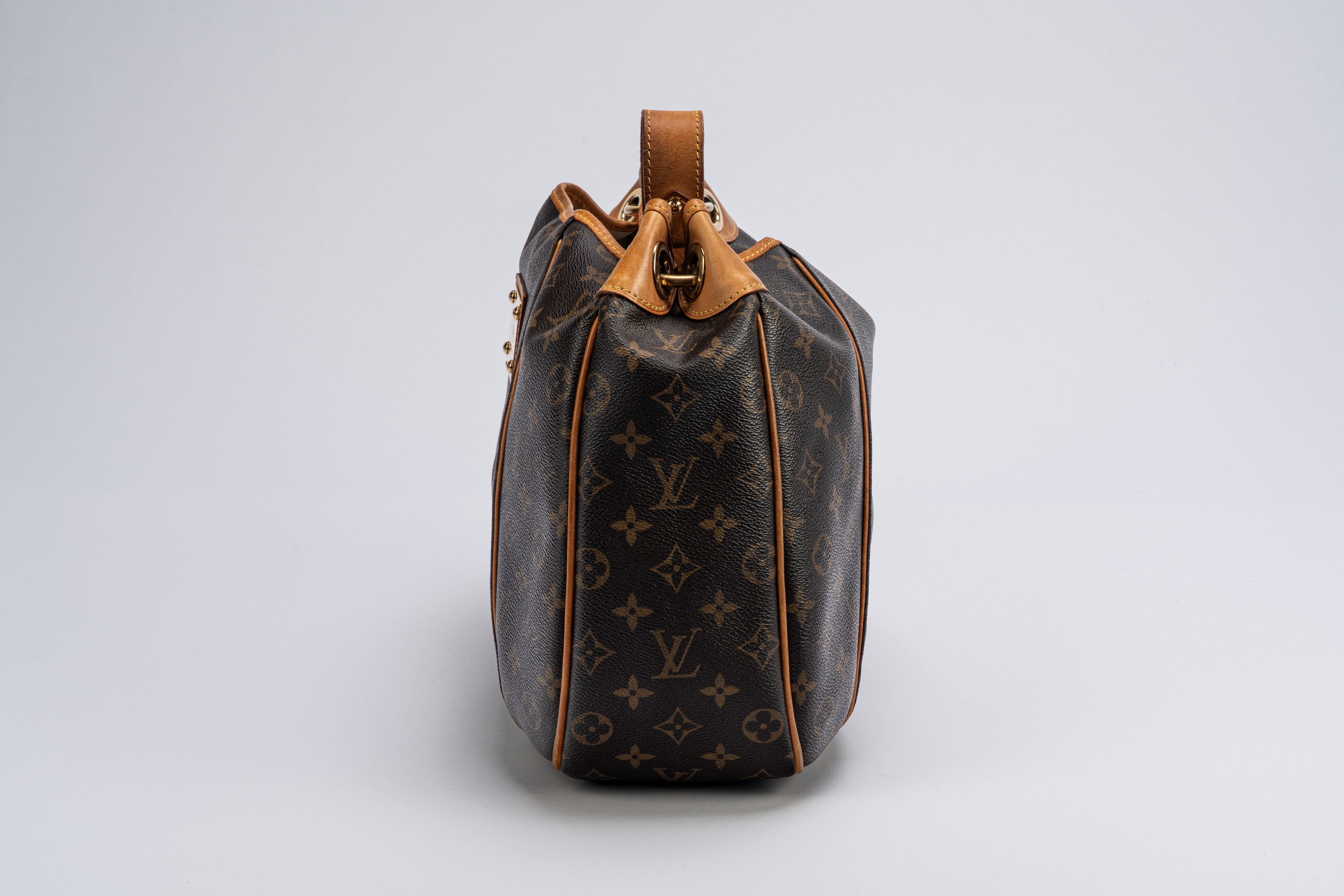 Louis Vuitton - Borsa Galliera, tela monogram, manico regolabile e profili in vacchetta (2009)