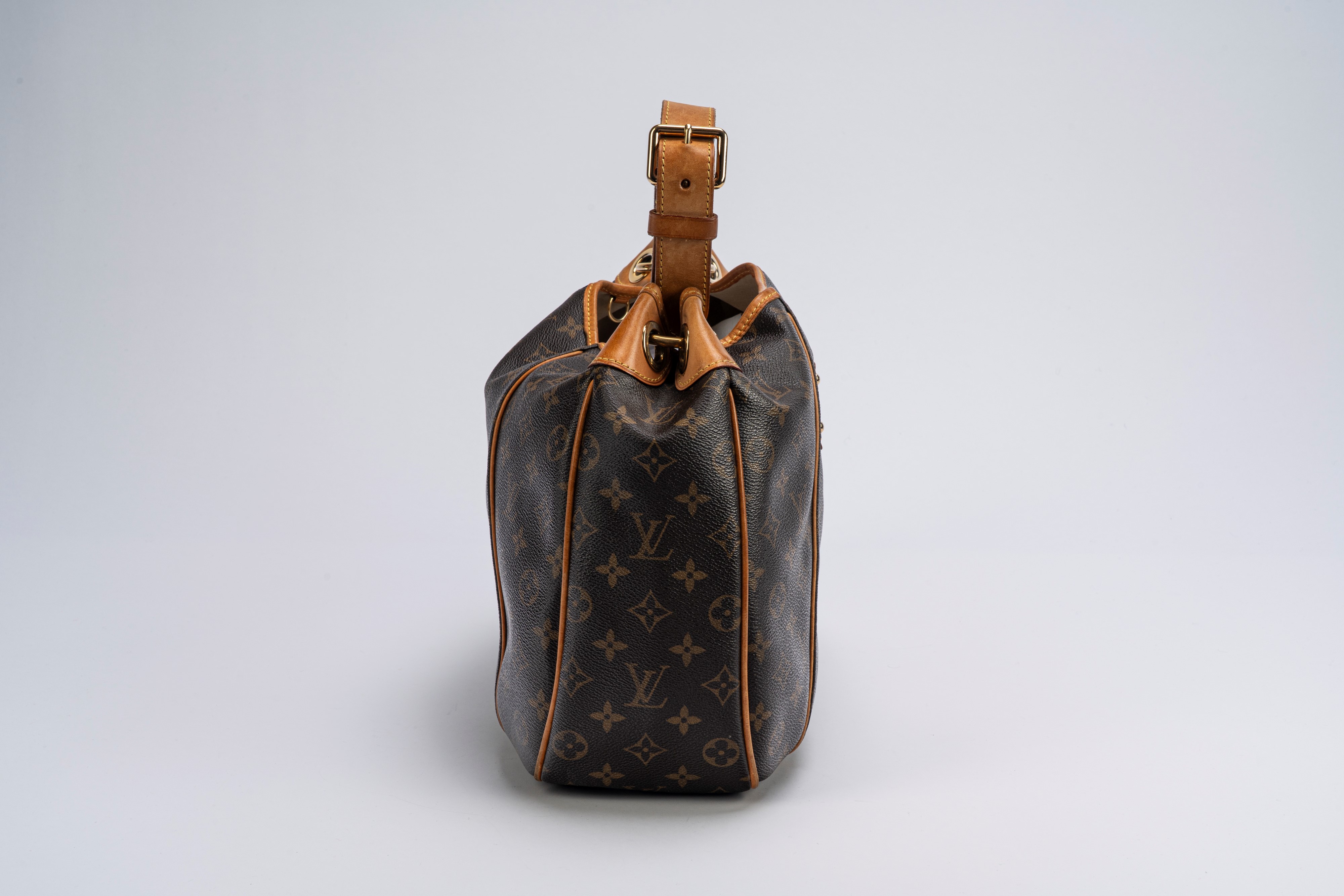 Louis Vuitton - Borsa Galliera, tela monogram, manico regolabile e profili in vacchetta (2009)
