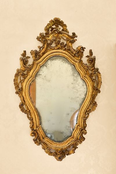 Coppia di Specchiere di Forma Mossa con Cornice Decorata a Fregi di Volute Fogliate. Veneto, Seco...