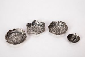 Three bowls and a leaf