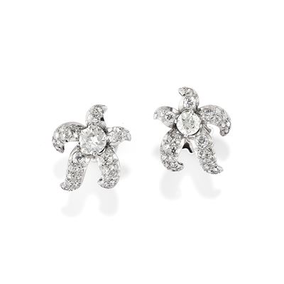 Orecchini a stella marina in oro bianco 18k con diamanti