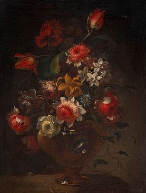 Peonies and other flowers in a vase