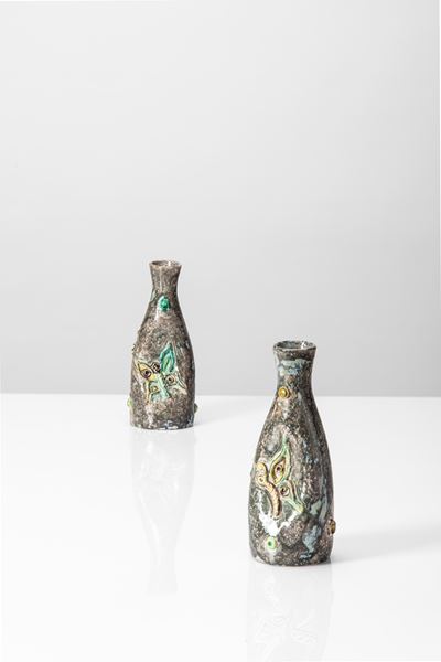 Coppia di vasi monofiore in ceramica smaltata