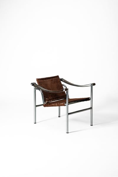 Poltroncina modello LC1 in acciaio cromato e cuoio