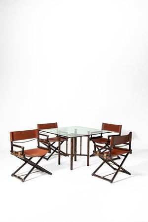 Set composto da un tavolo da pranzo e quattro poltroncine da regista
