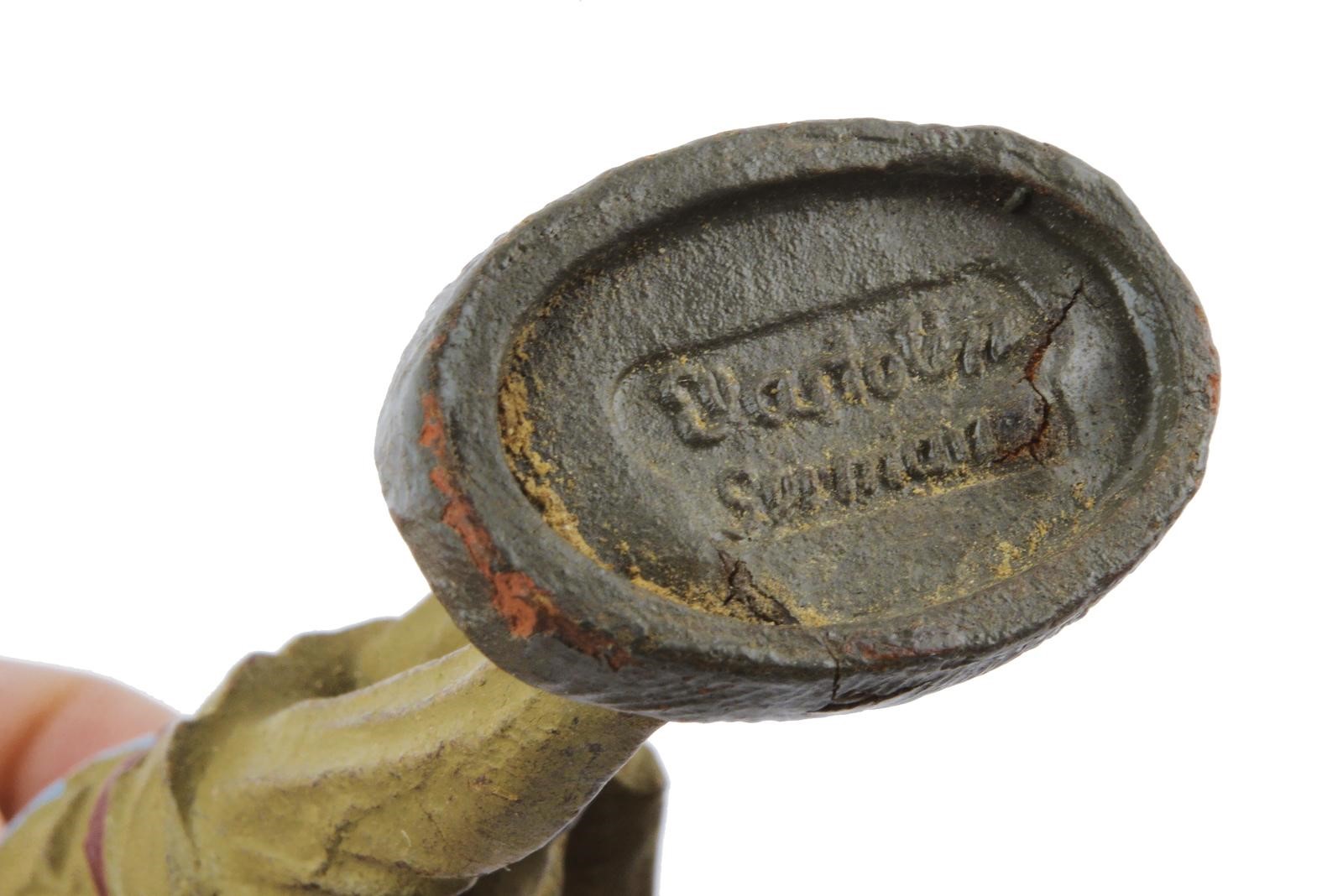 Franco Elastolin, Figura in pasta policroma con braccio e testa in porcellana