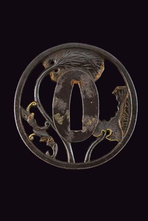 A tsuba with aoi and myoga motifs