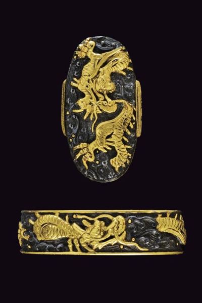 Fuchi-kashira, decorazioni in shakudō e oro con draghi, periodo Edo