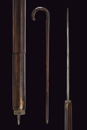 A rare sword stick with spring blade