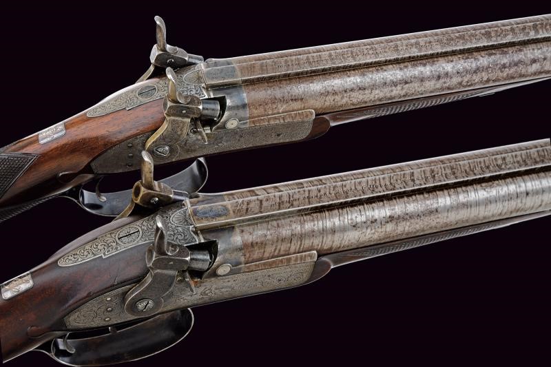 Joseph Manton & Son, Coppia di doppiette a luminello con incisioni a racemi, prima metà XIX secol...