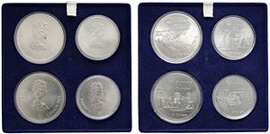 Cofanetto contenente 4 monete da 5 e 10 dollari 1973, dedicate alle Olimpiadi di Montr&eacute;al 1976.