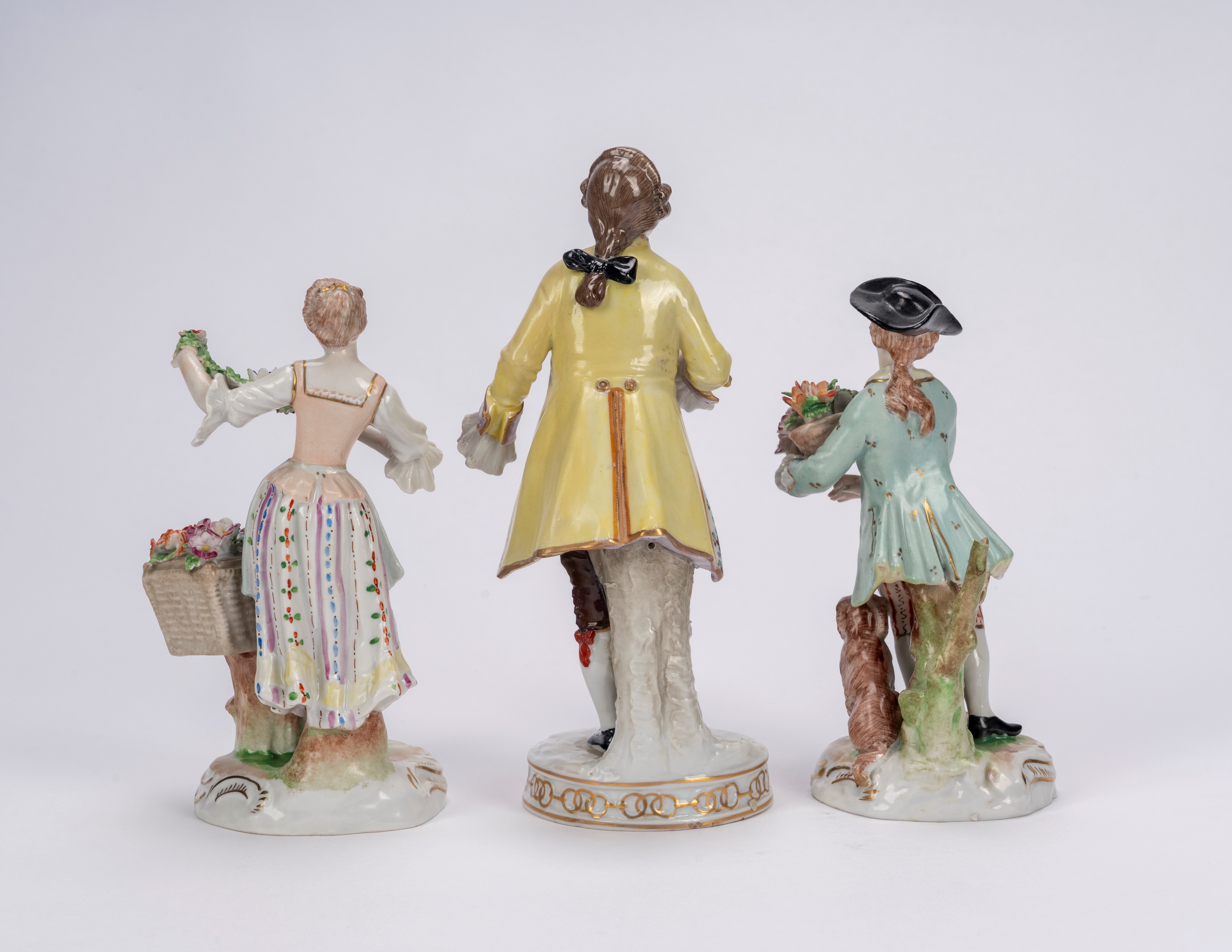 Germania, Tre figure in porcellana policroma (coppia di giardinieri e gentiluomo), secolo XIX-XX