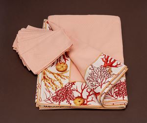 Coral-colored cotton tablecloth with a nautical motif border accompanied by 12 napkins.
