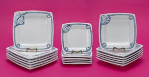 Set of six in white glazed ceramic with blue shell and peak decoration