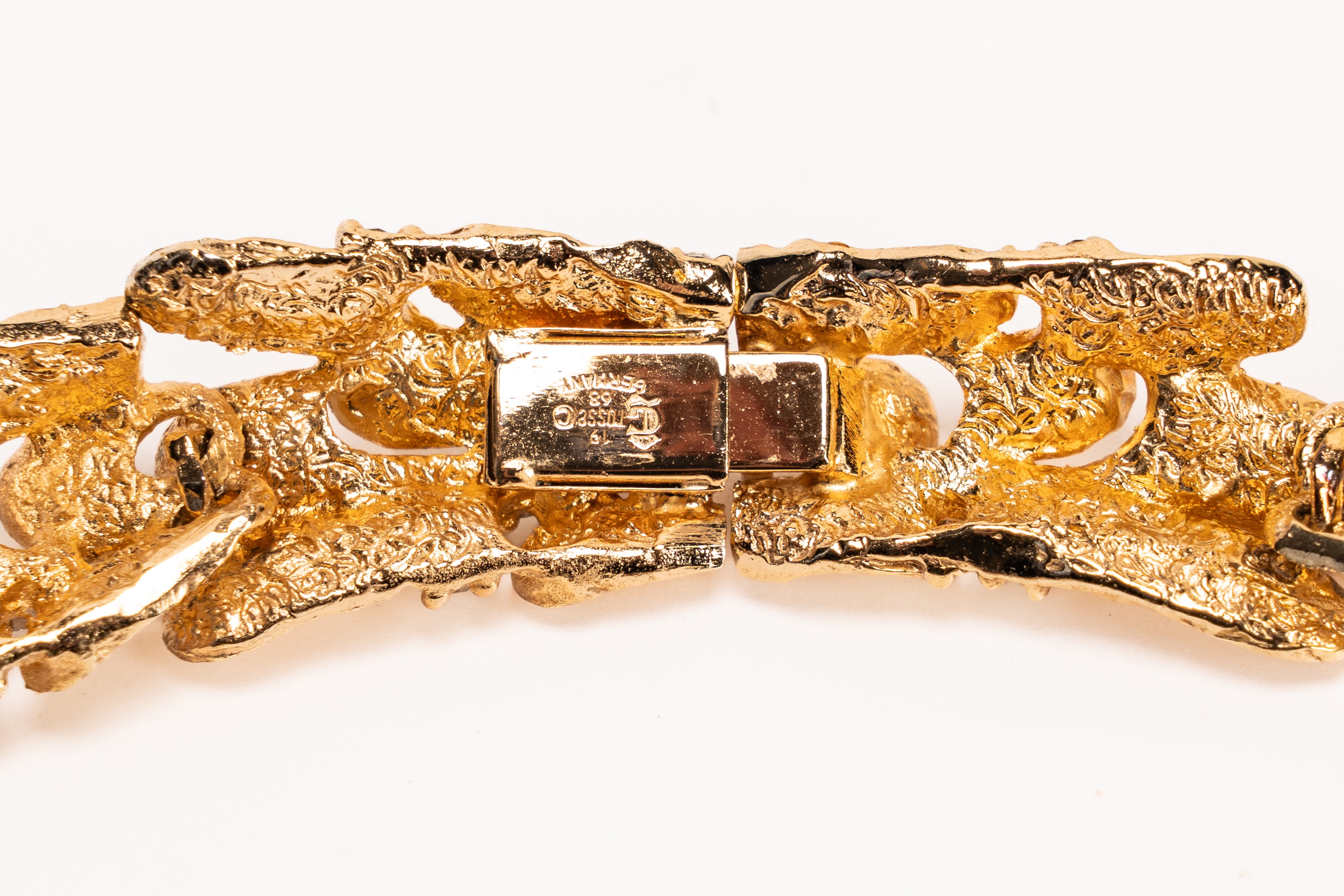 Grosse per Christian Dior - Collier snodato con elementi in metallo dorato satinato e strass, 196...