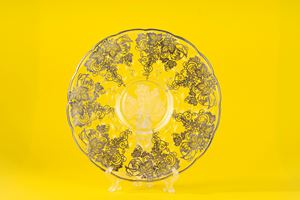 Centrotavola in vetro molato con decori in metallo argentato