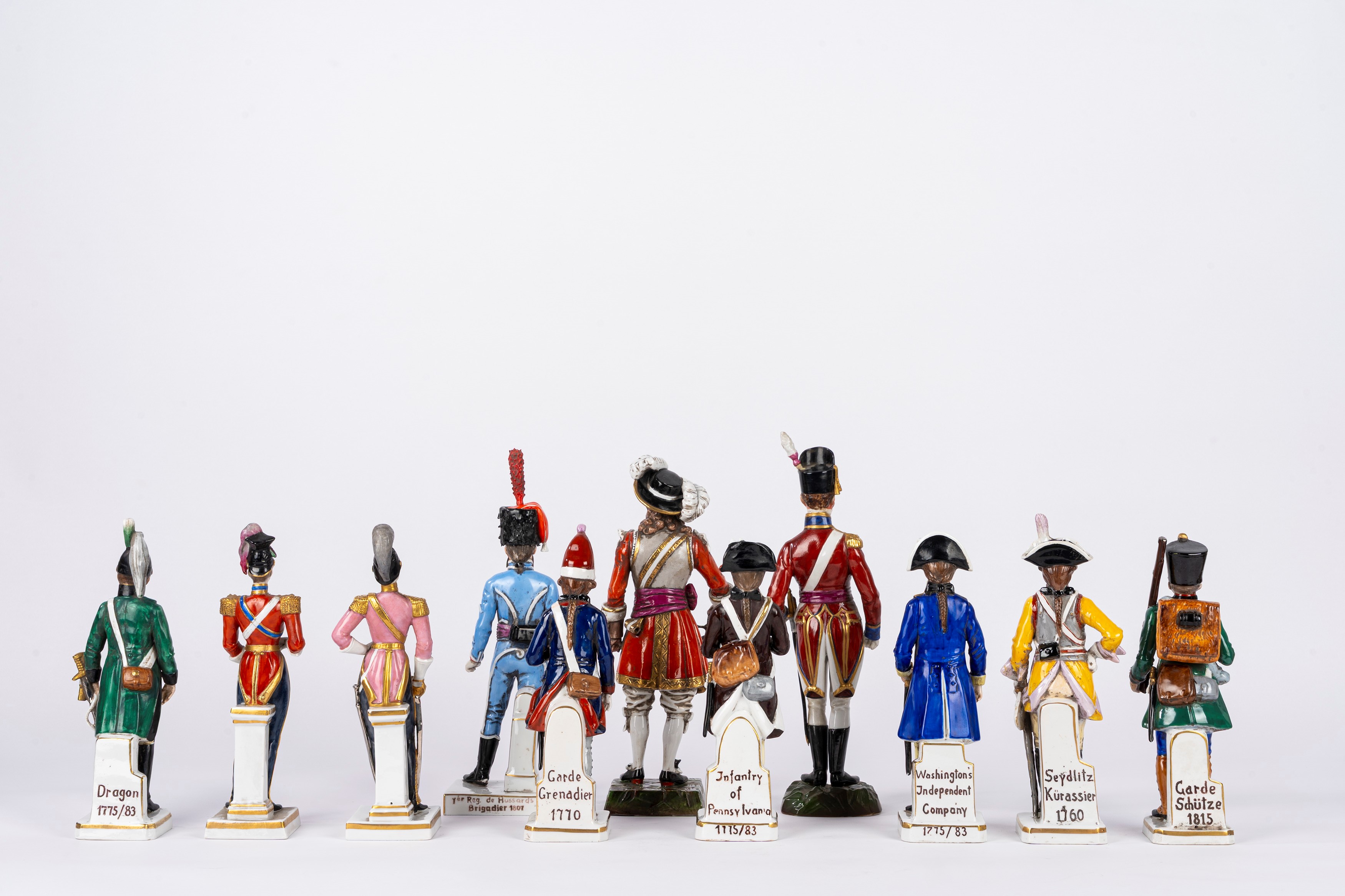 Collezione di 11 soldatini e statuine in porcellana policroma, Capodimonte/Herend/Ludwigsburg, XX...