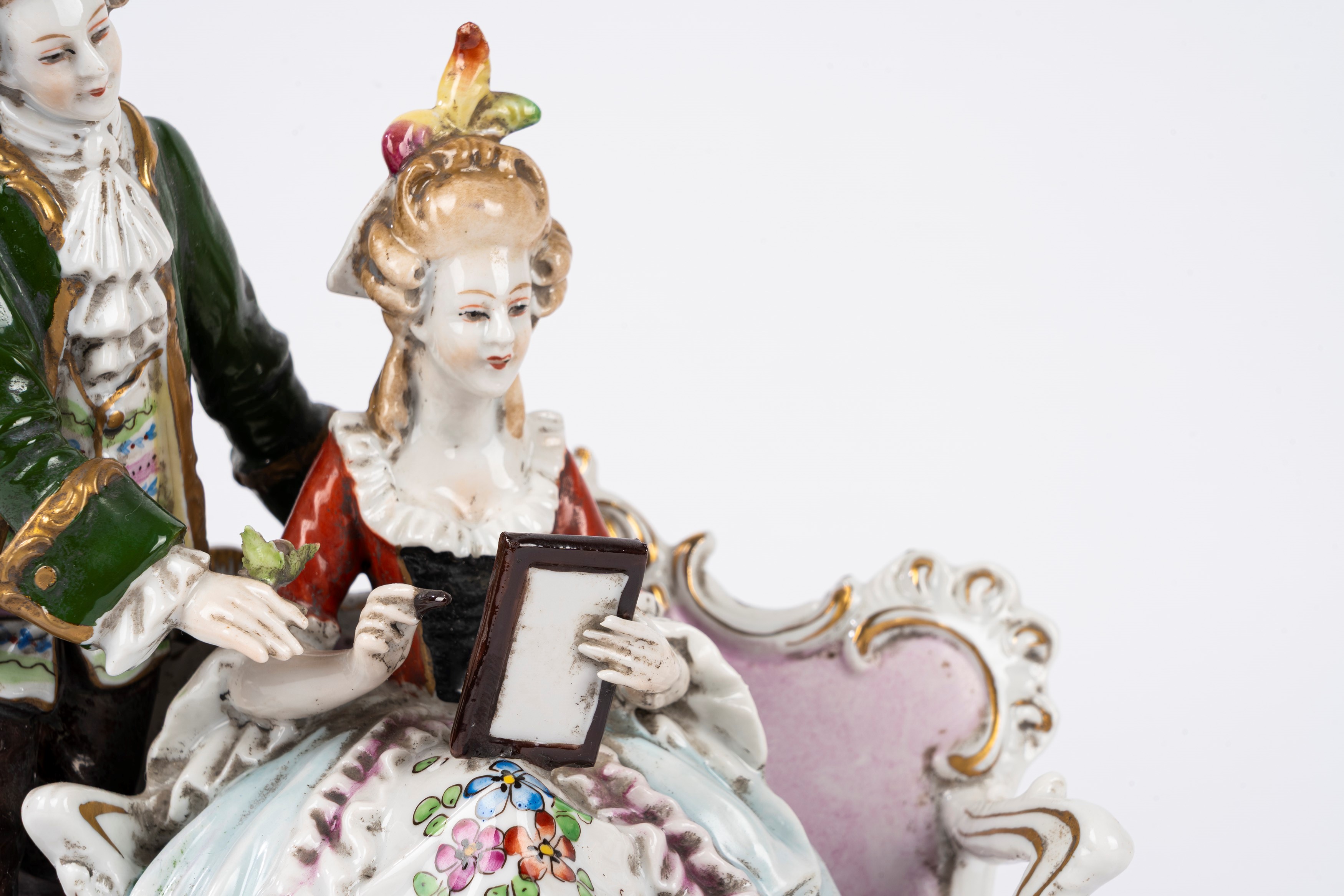Manifattura di Capodimonte, Tre sculture in porcellana policroma (coppia galante, pastorella con ...