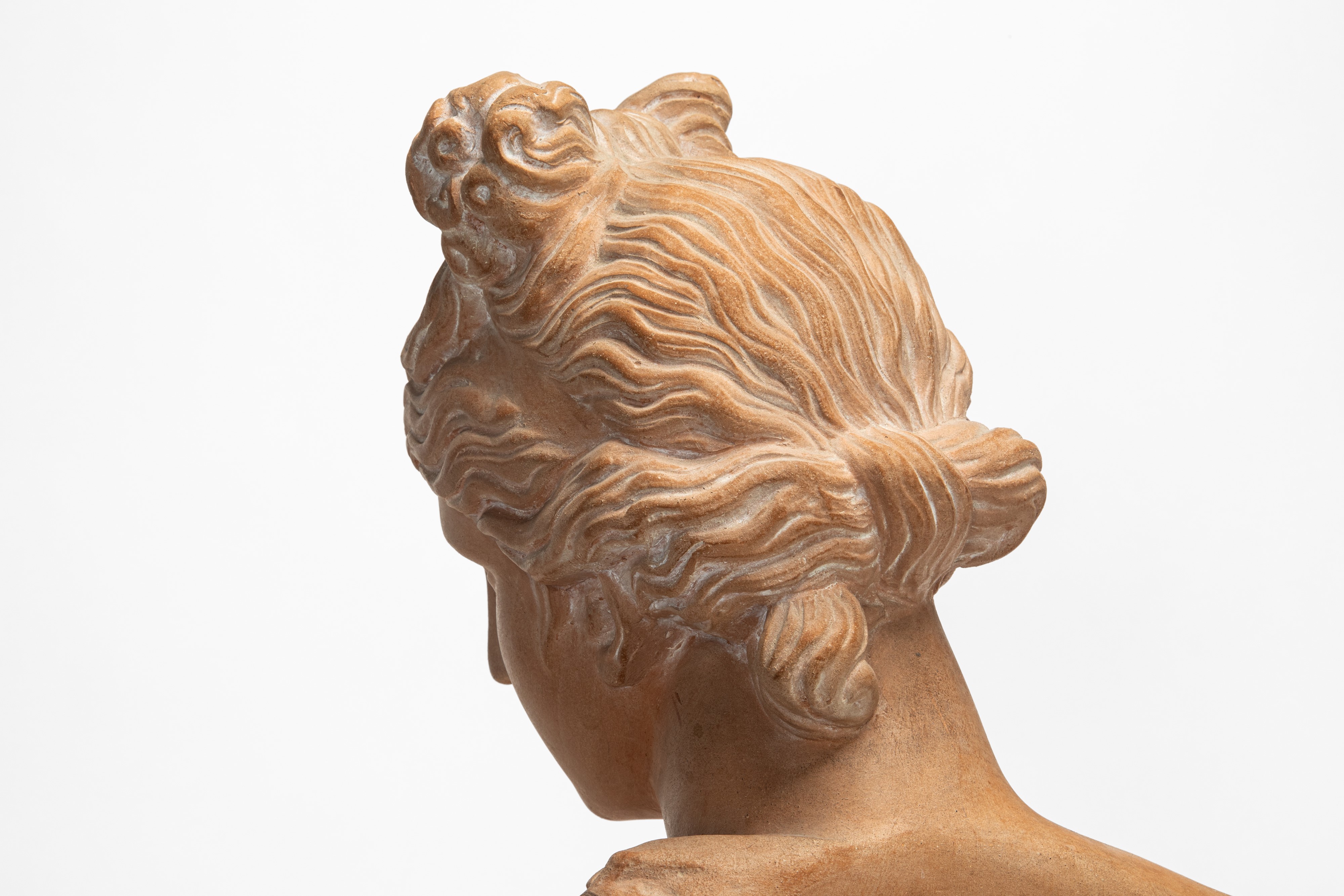 Due busti raffiguranti Antinoo e Venere, terracotta patinata