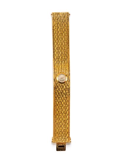 Bracciale-orologio in oro giallo 18k con movimento a carica manuale