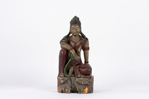 Scultura in legno policromo raffigurante Buddha seduto, secolo XX