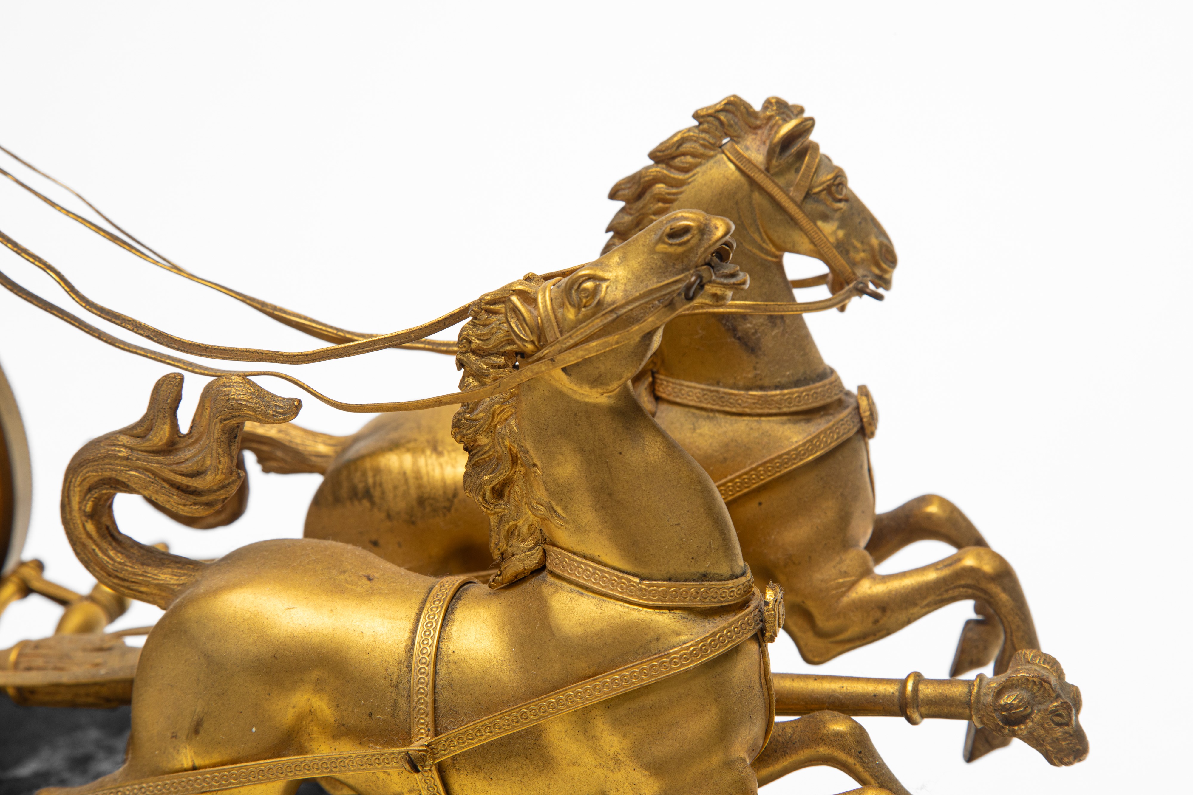 Orologio da tavolo, marmo e bronzo dorato, inizio XIX secolo