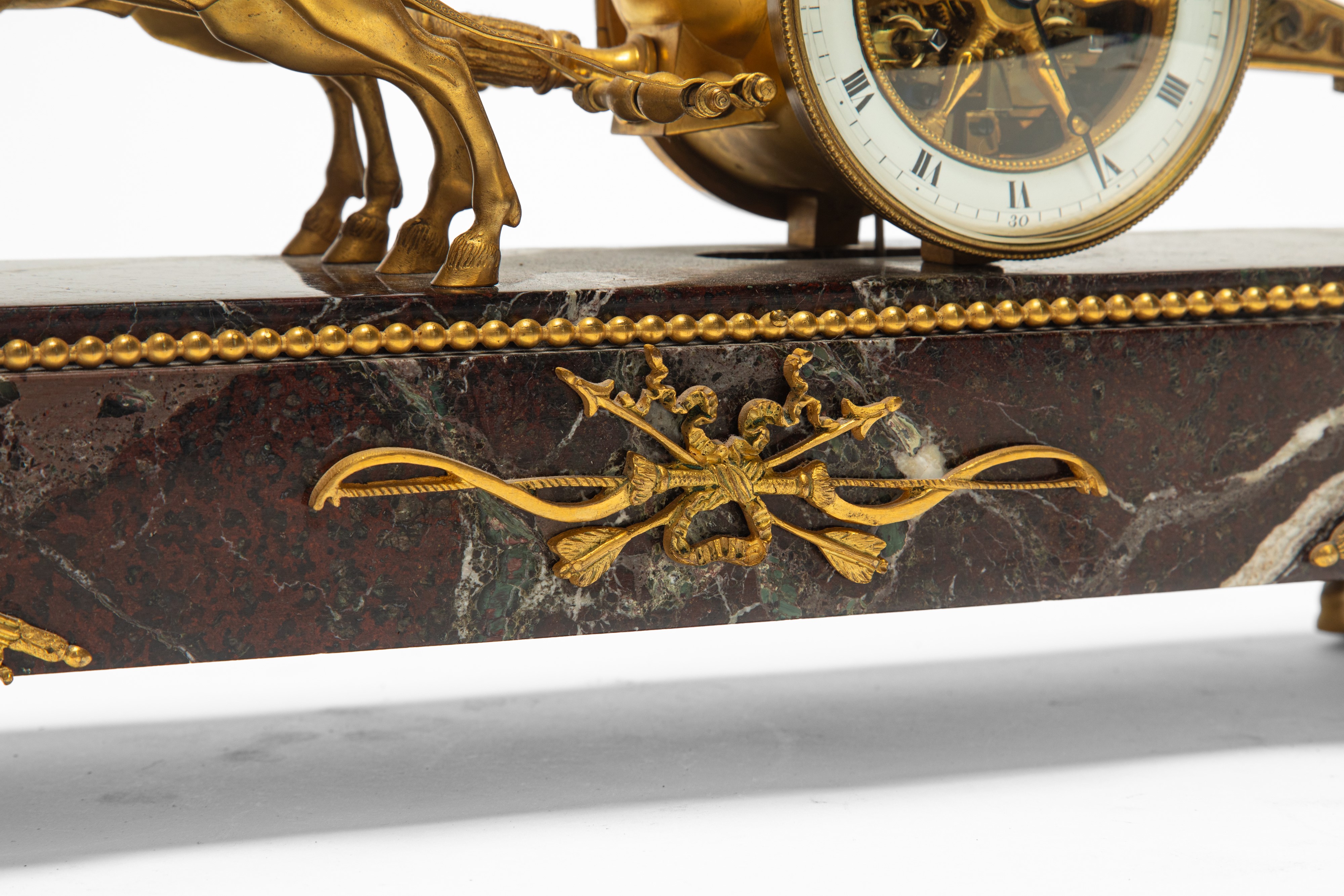 Orologio da tavolo, marmo e bronzo dorato, inizio XIX secolo