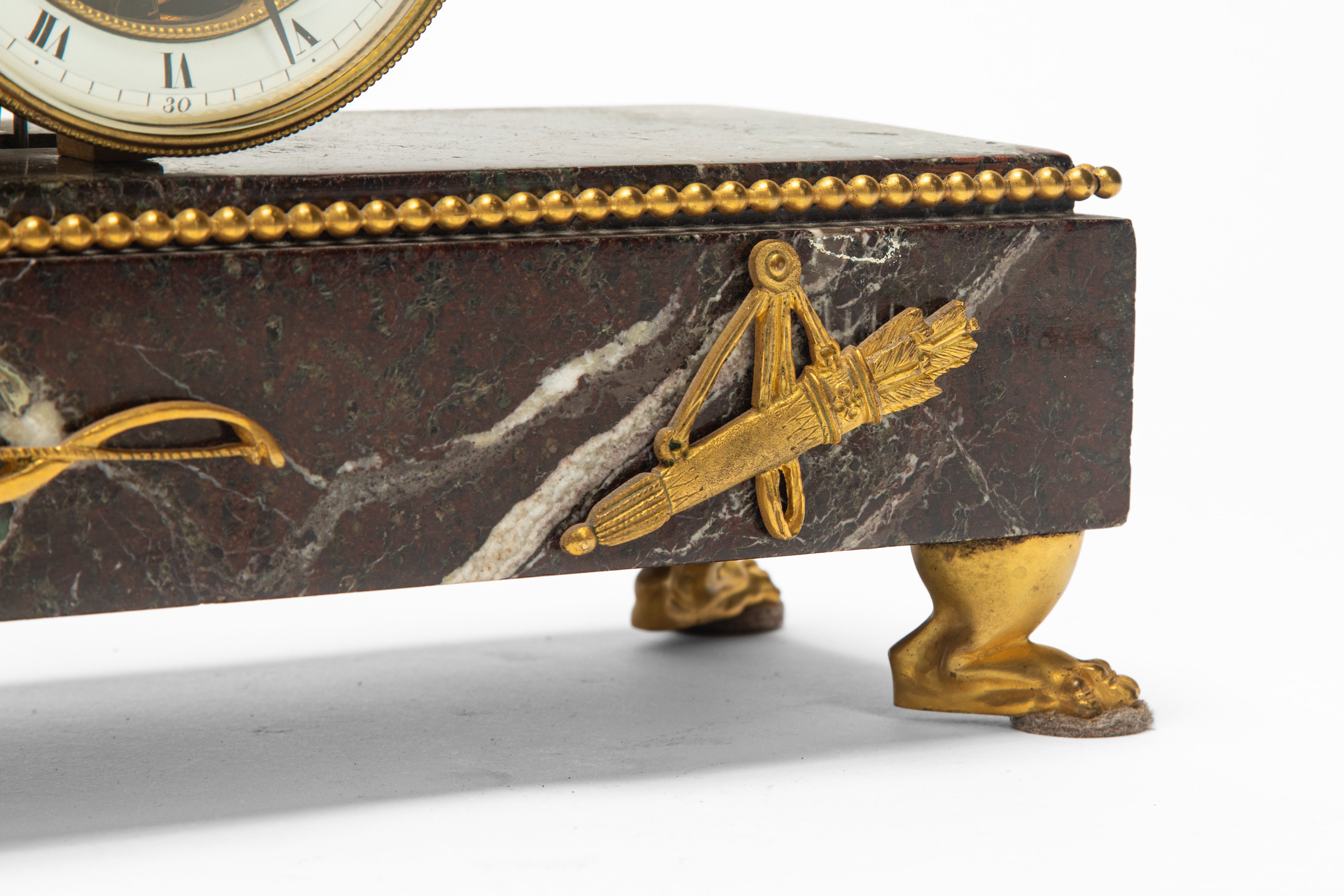 Orologio da tavolo, marmo e bronzo dorato, inizio XIX secolo