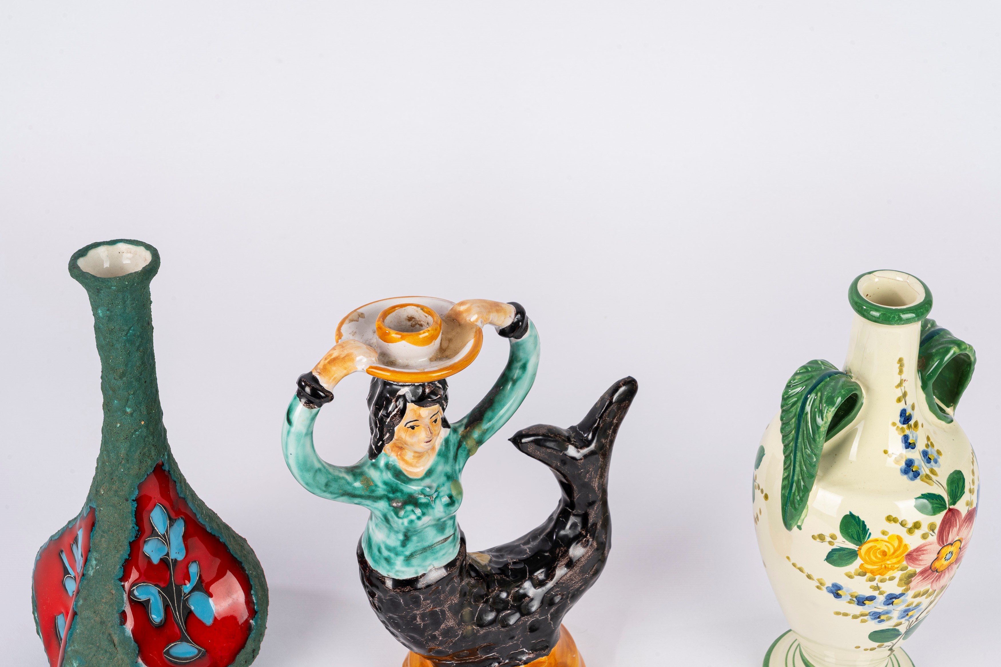 Manifattura di Positano, Candeliere a forma di sirena in ceramica policroma; Deruta, Coppia di bo...