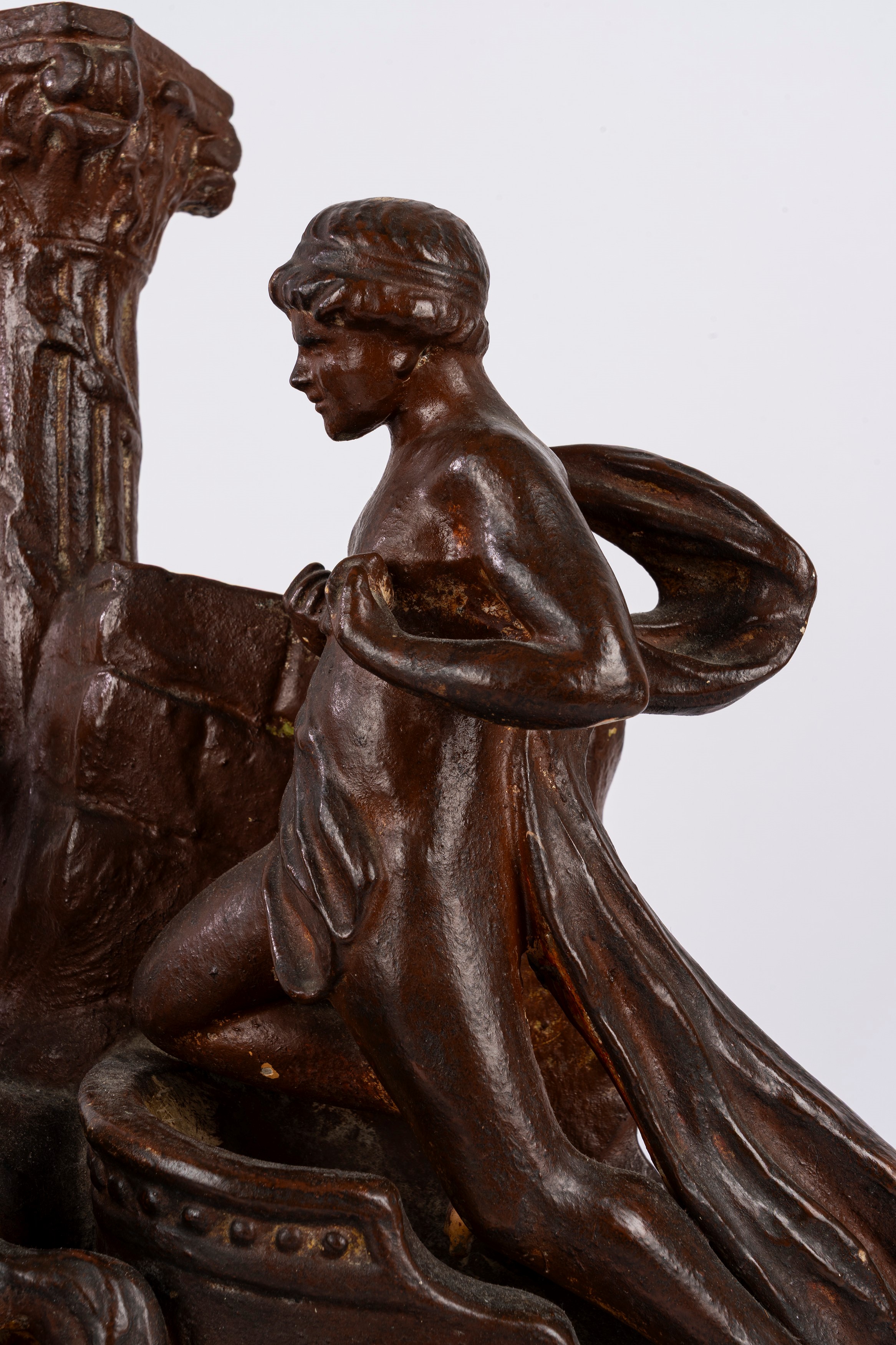 Scultura raffigurante auriga, terracotta smaltata a finto bronzo, con orologio