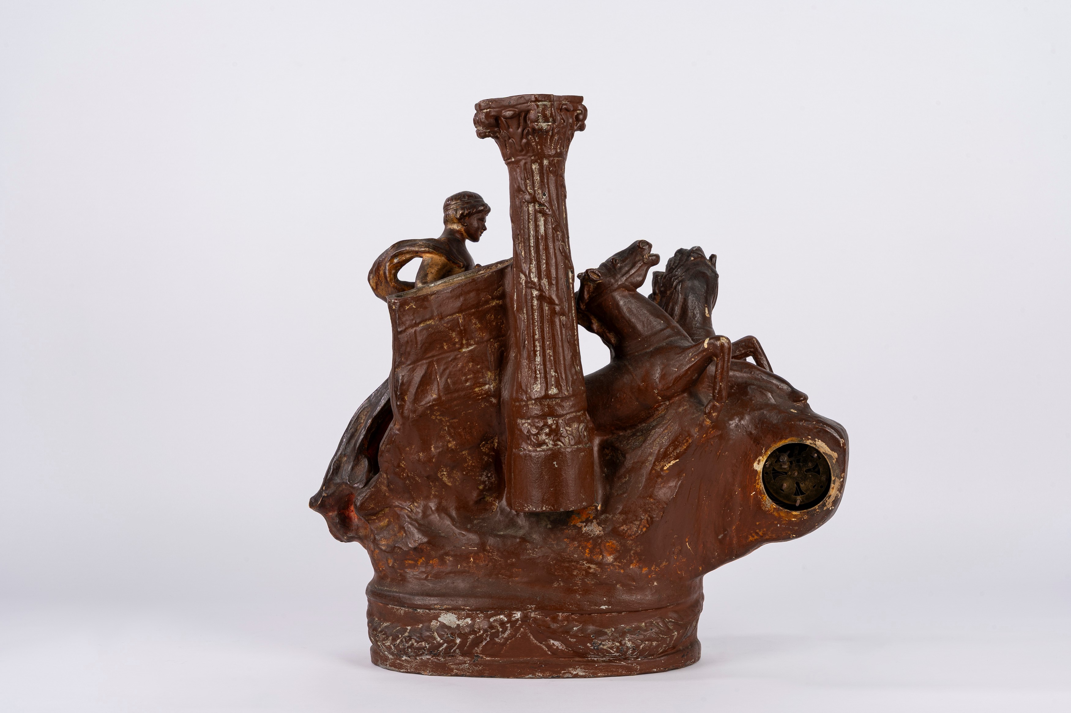 Scultura raffigurante auriga, terracotta smaltata a finto bronzo, con orologio