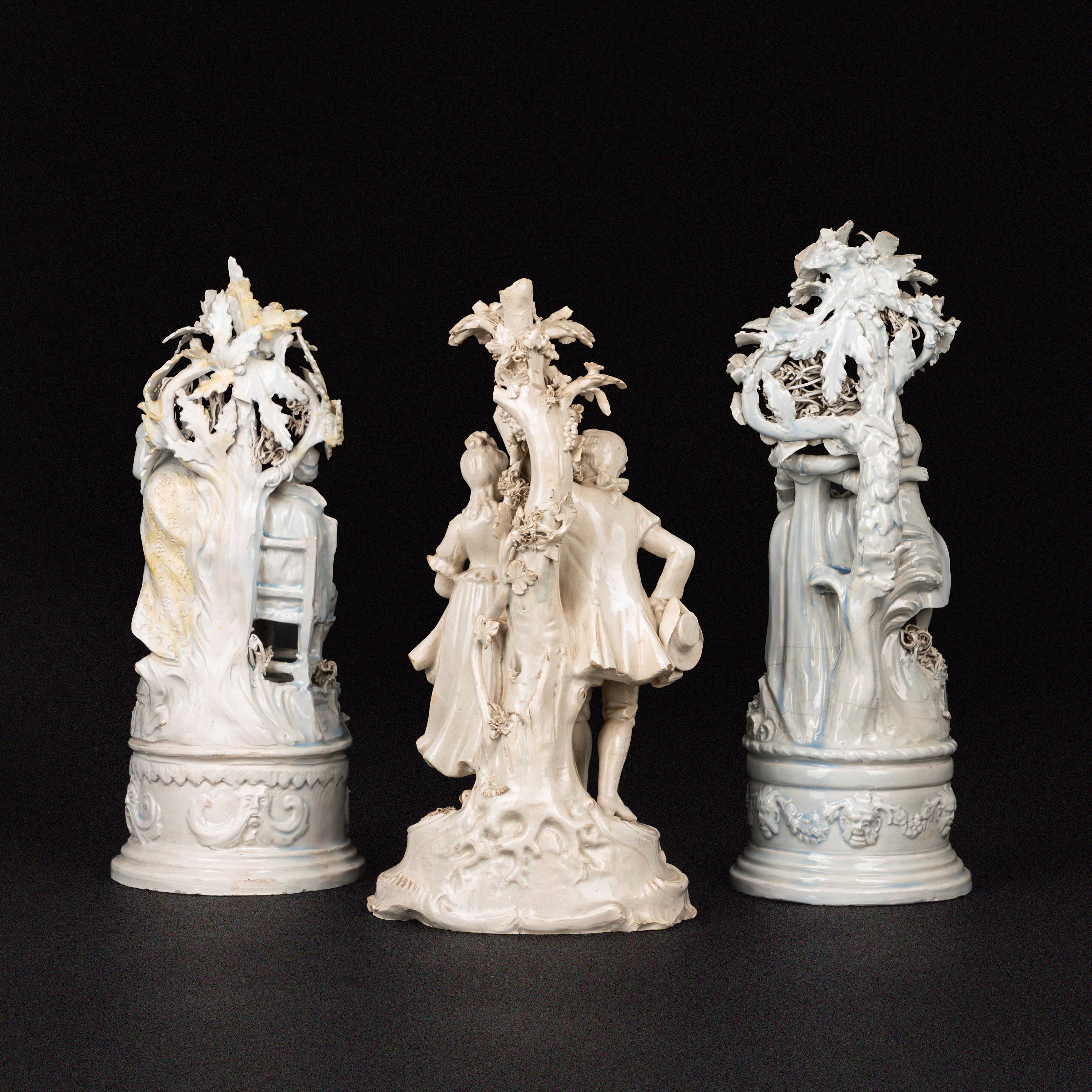 Bunato Bassano, Tre gruppi scultorei in terraglia invetriata con soggetti di popolani e coppie ga...